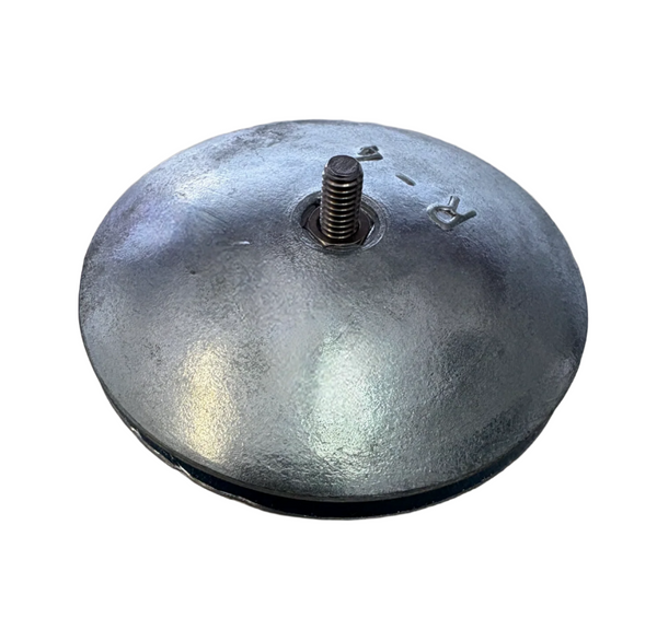 Metallic dome-shaped object with a threaded central post on a beige background