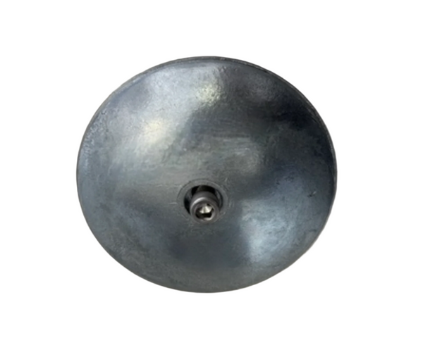 Metallic dome-shaped object with a central hole on a gray background